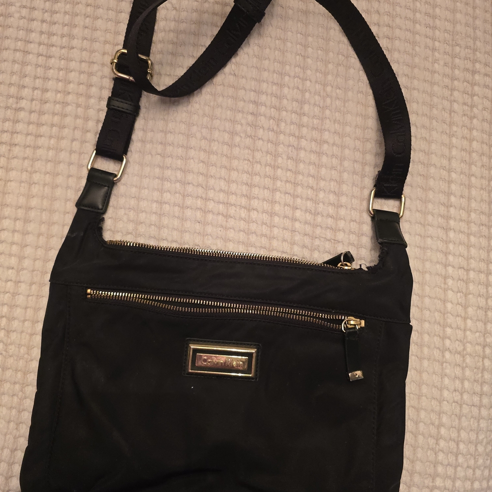 Calvin Klein Black Crossbody with Gold Details!